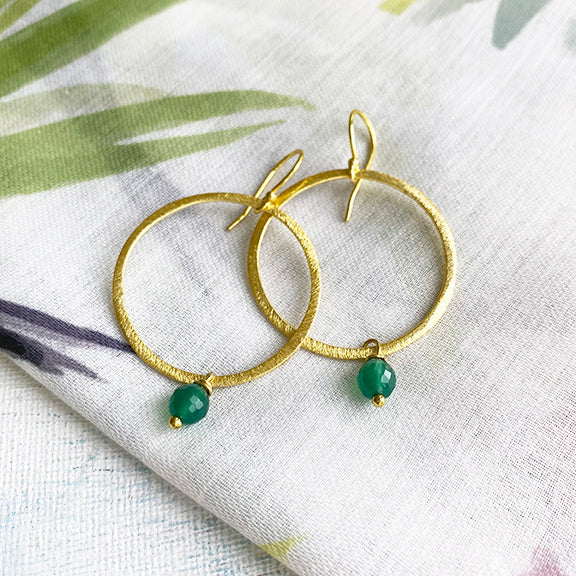 Large gold and green earrings